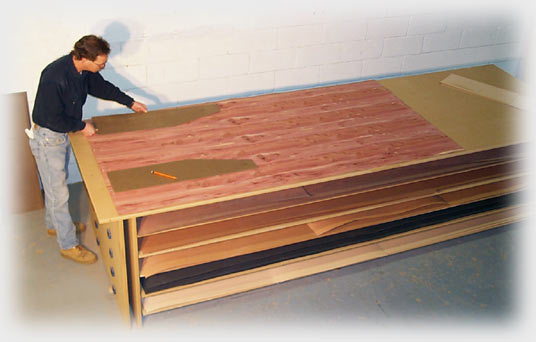 Joe laying out the pattern for a Kestrels on Aromatic Cedar Veneer