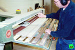Final sanding on the stroke sander